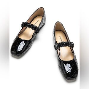 Elegant Black Quilted Flats by Crocodile